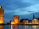 La Rochelle towers at night